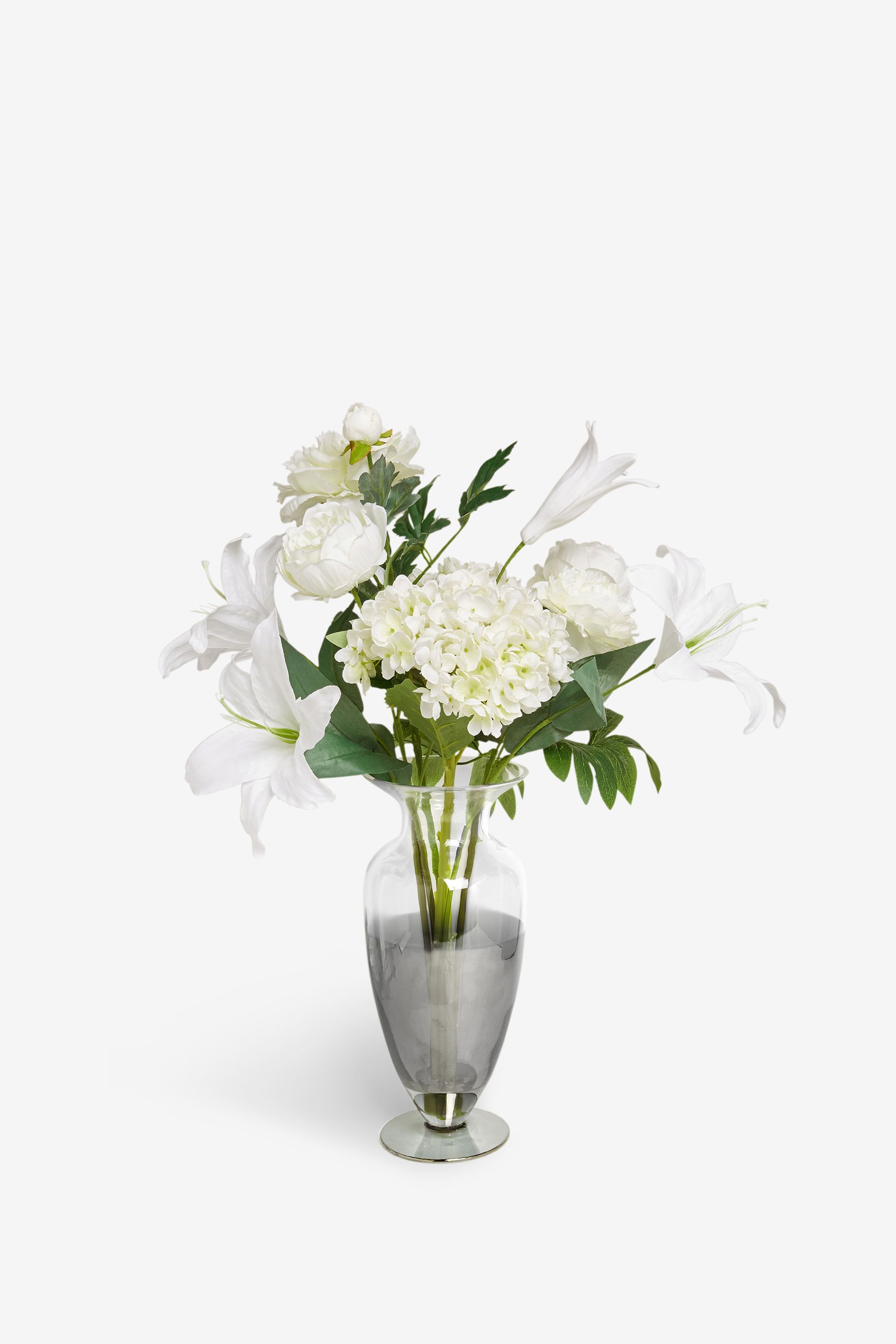Buy Artificial White Flowers In Ombre Silver Glass Vase from Next Ireland