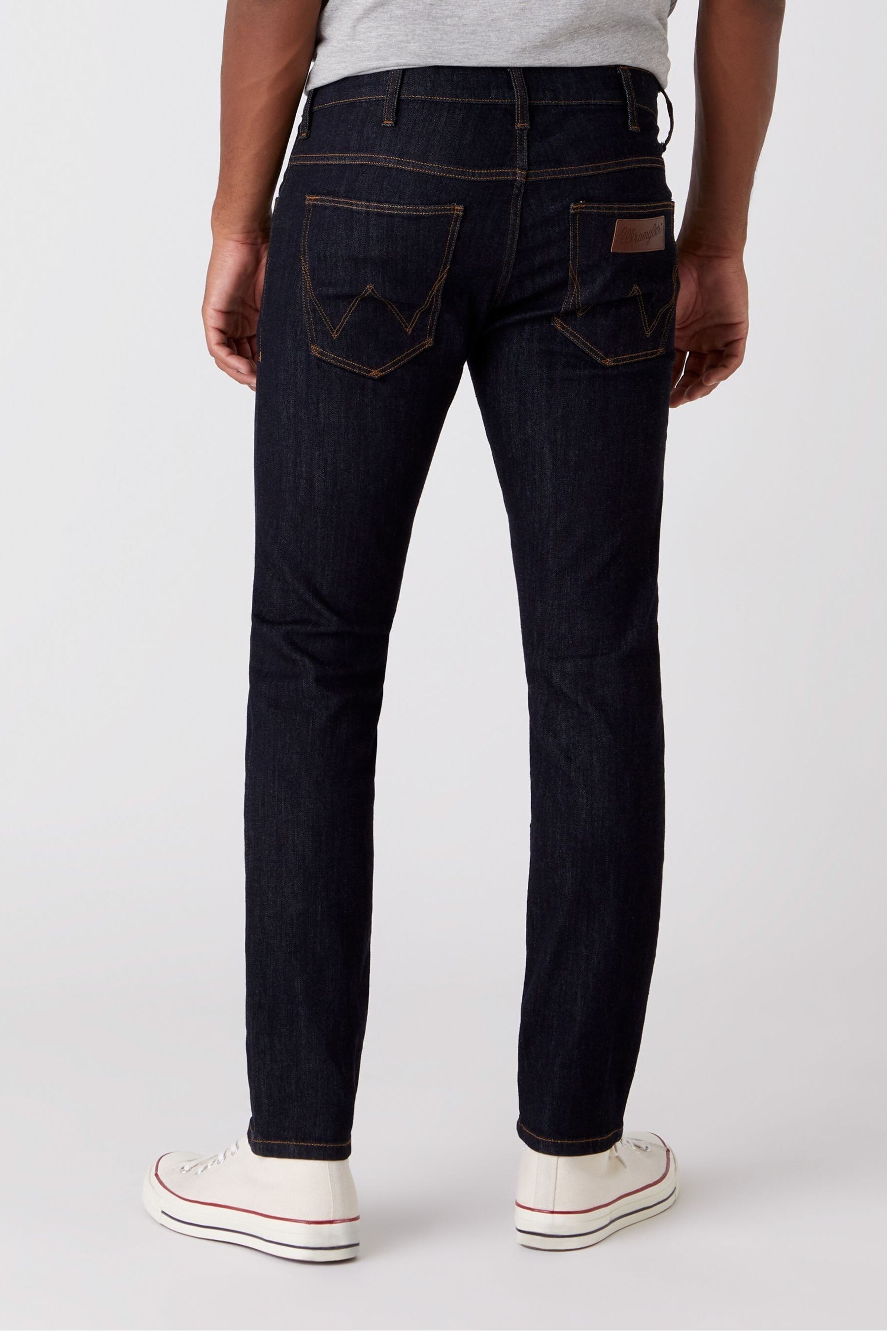 Buy Wrangler Larston Dark Rinse Slim Tapered Jeans from Next Ireland