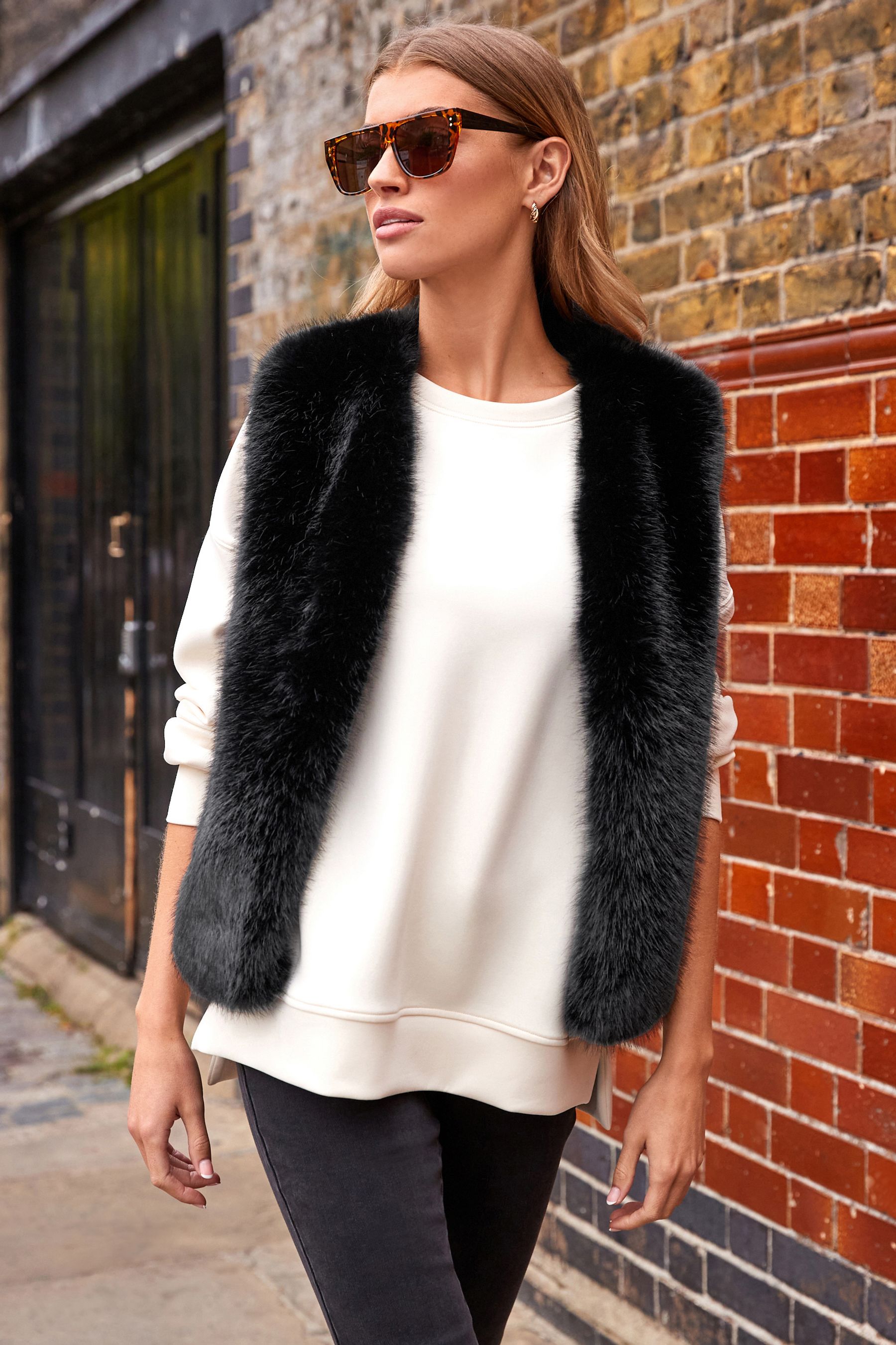 Buy Black Faux Fur Gilet from the Next UK online shop