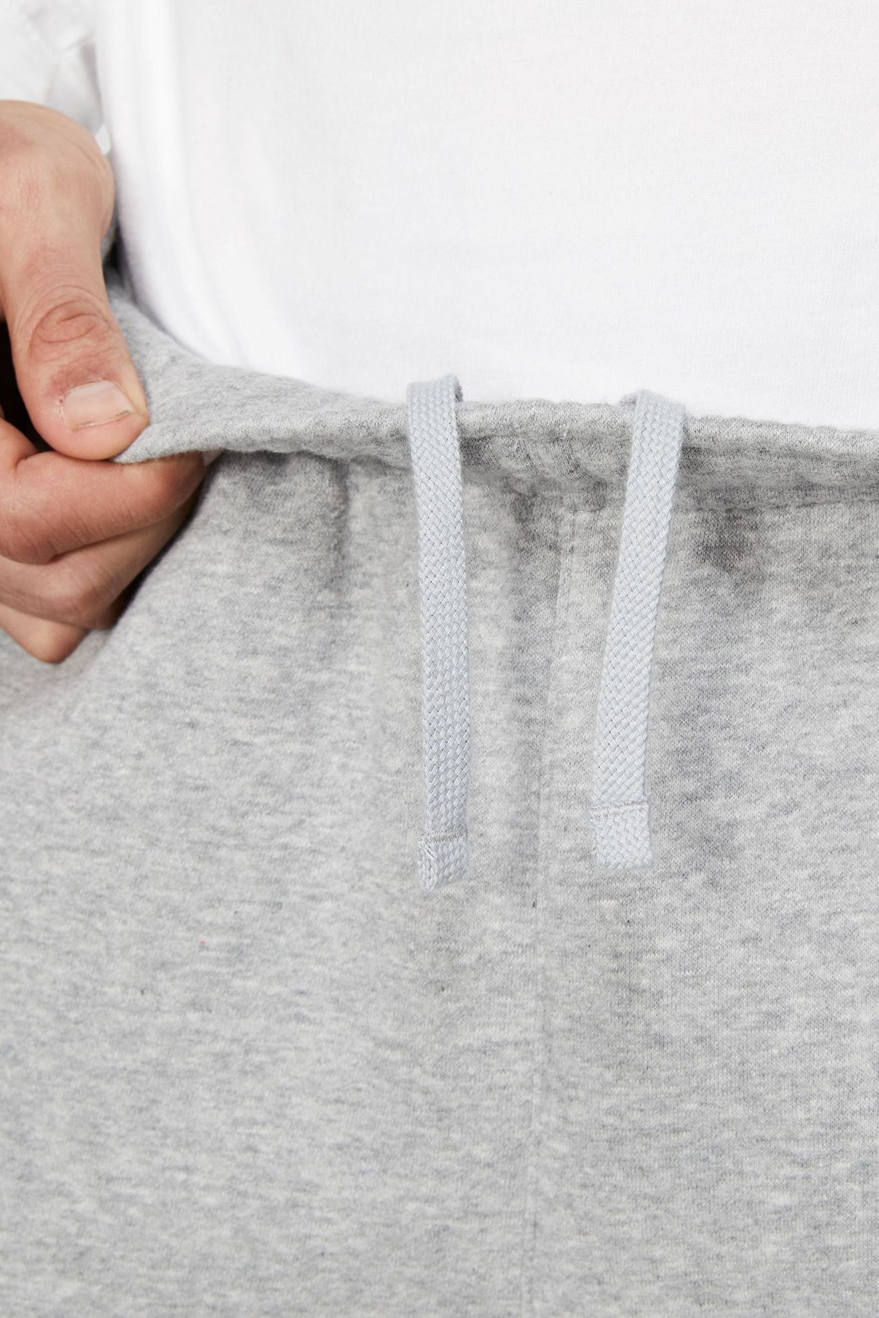 Buy Nike Light Grey Club Cuffed Joggers from the Next UK online shop