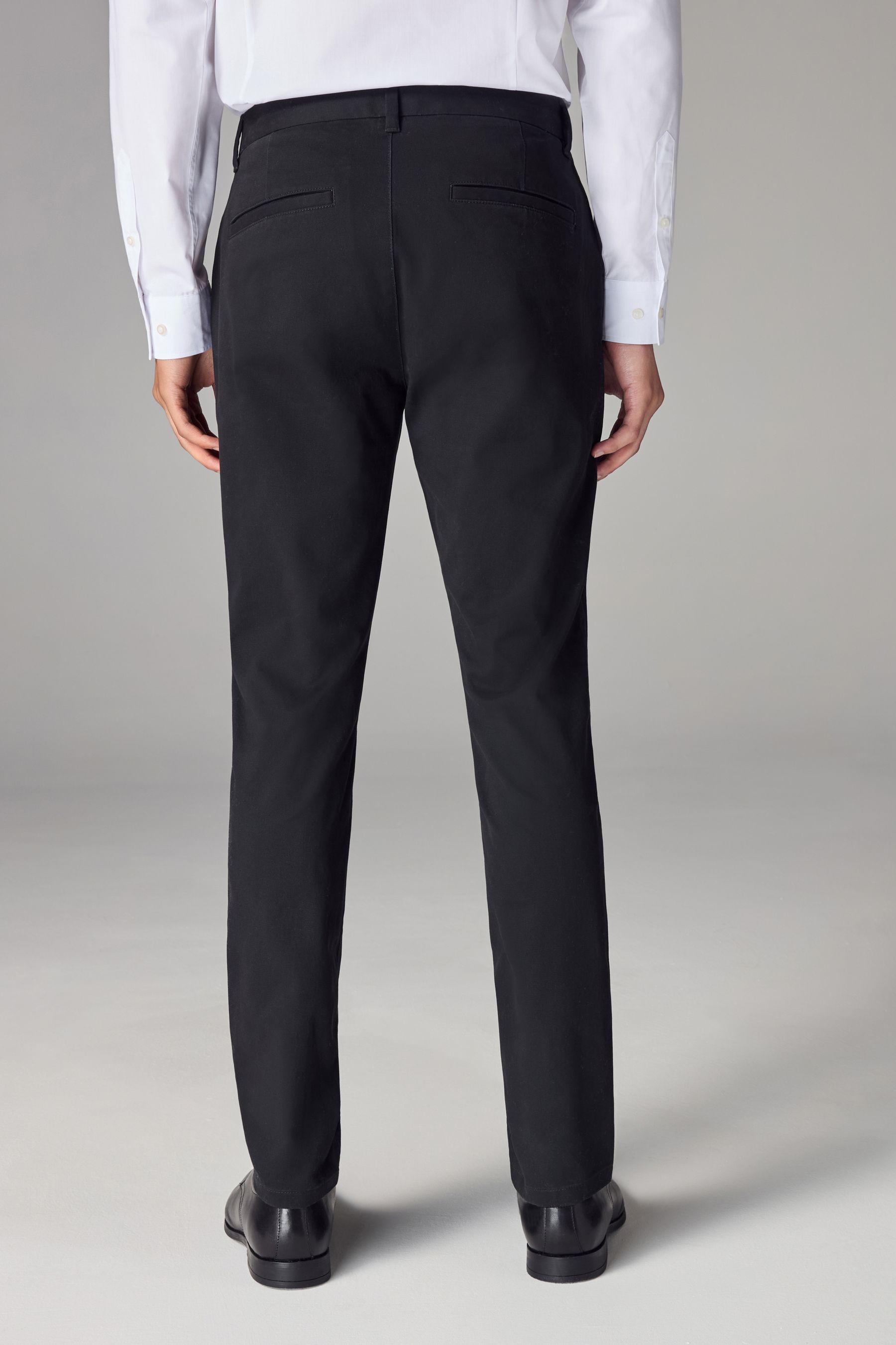 Buy Black Stretch Skinny Fit Chino Trousers from the Next UK online shop