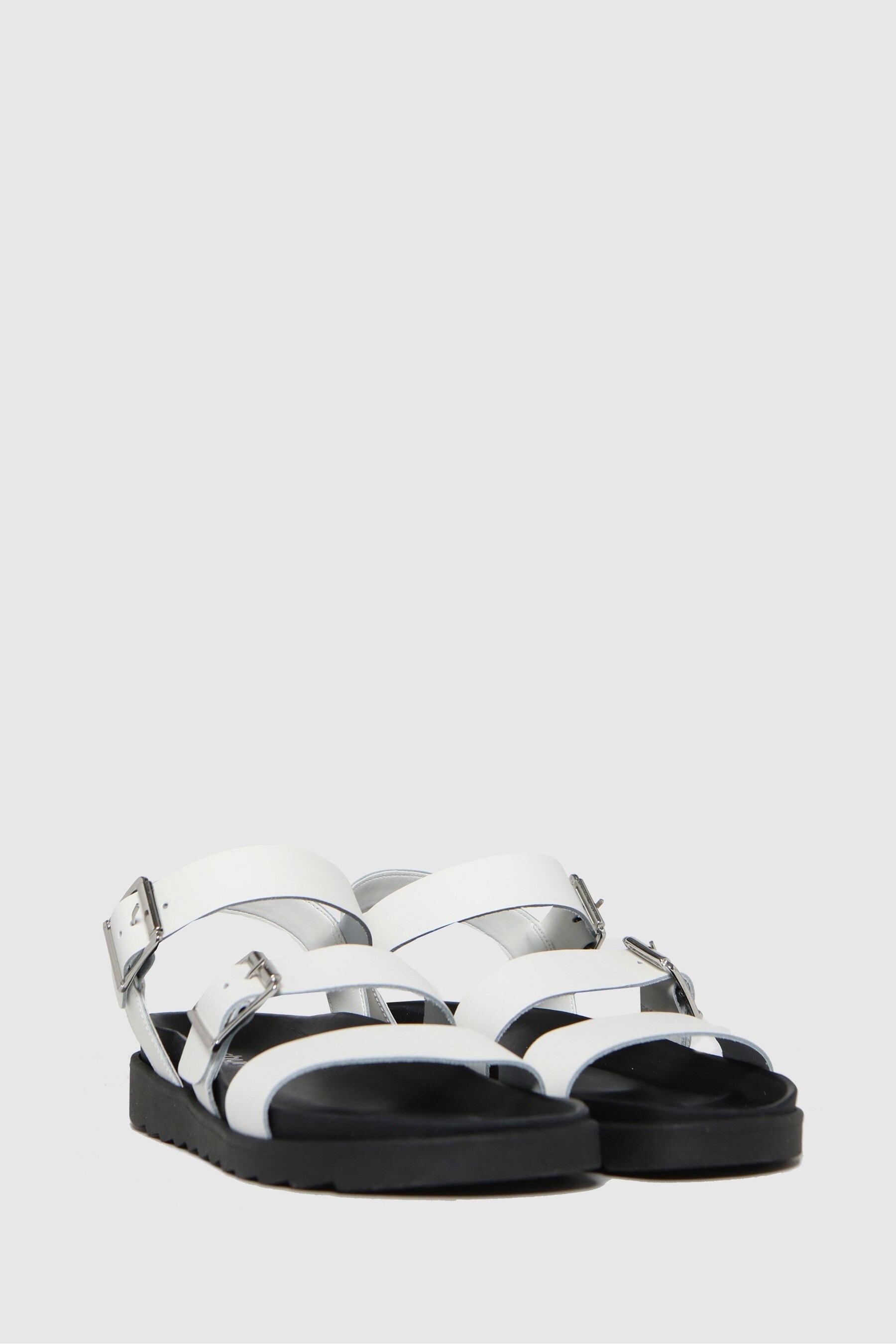 schuh chaser leather chunky buckle sandals in black