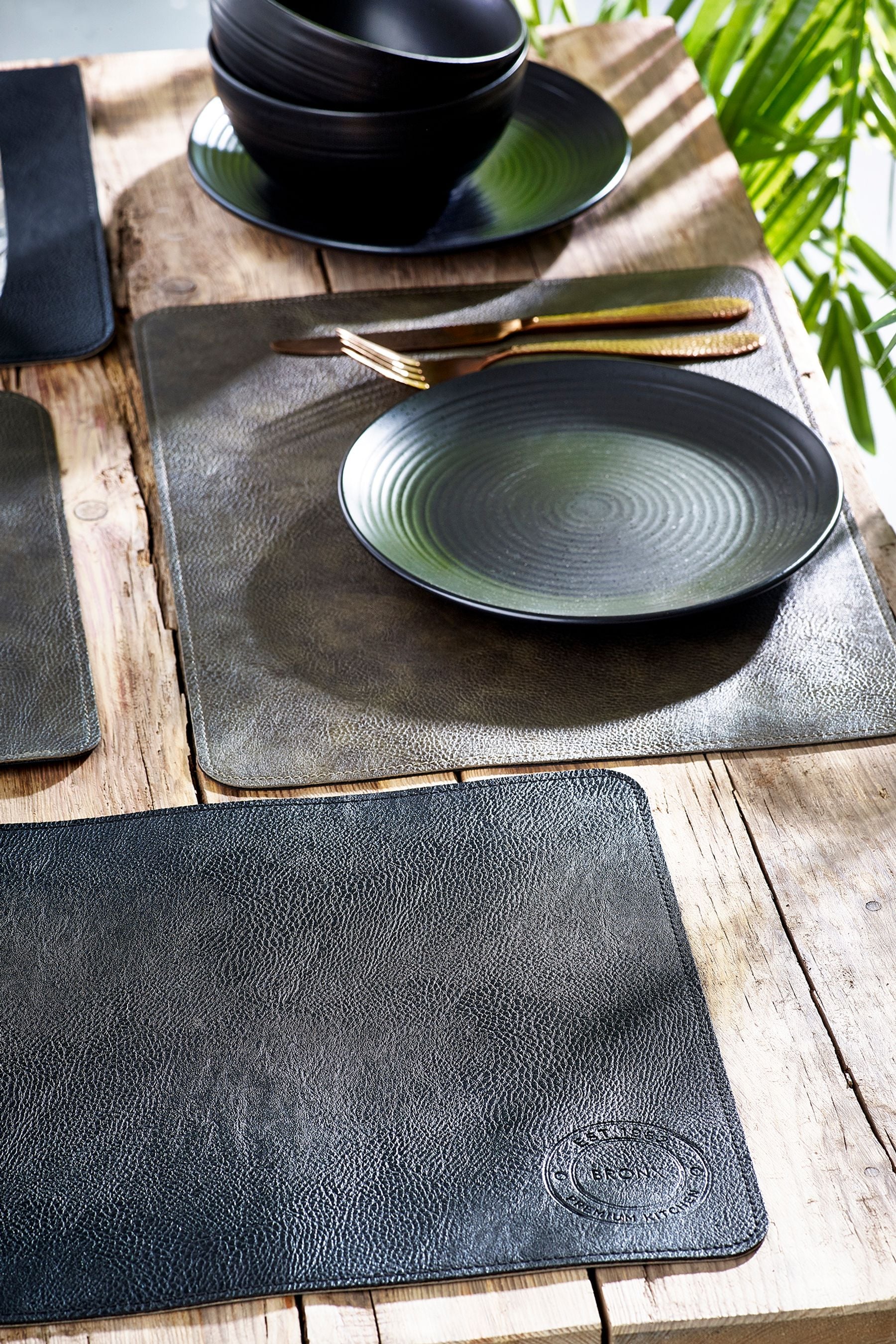 Buy Set of 4 Bronx Reversible Faux Leather Placemats from the Next UK