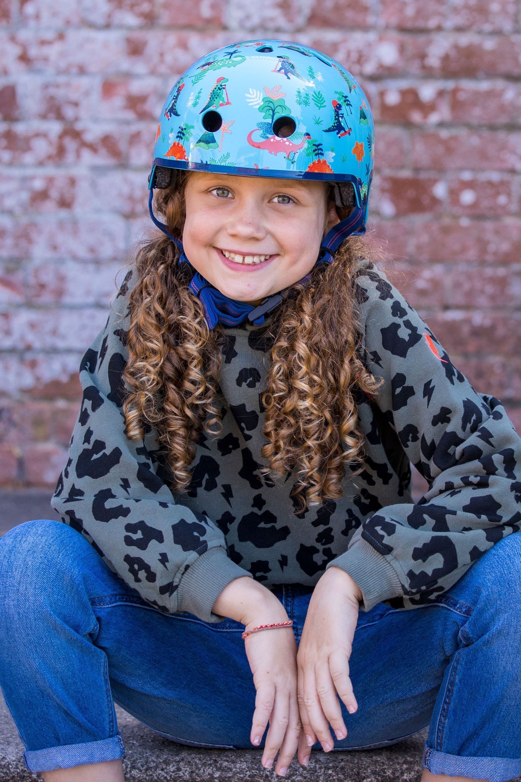 Buy Micro Scooters Blue Dinosaur Curved Deluxe Helmet from the Next UK