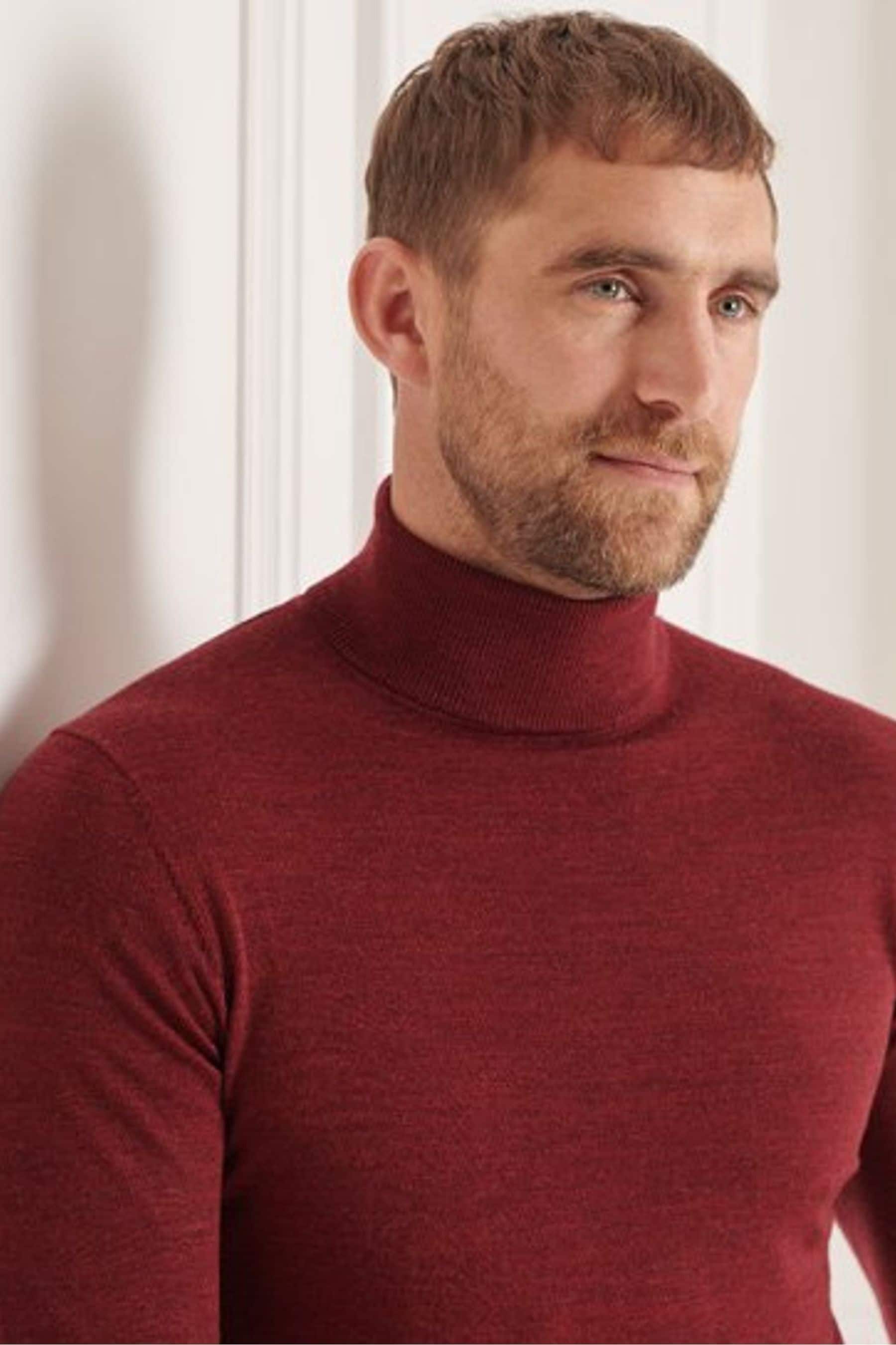 Buy Superdry Studios Red Merino Roll Neck Jumper from the Next UK online shop
