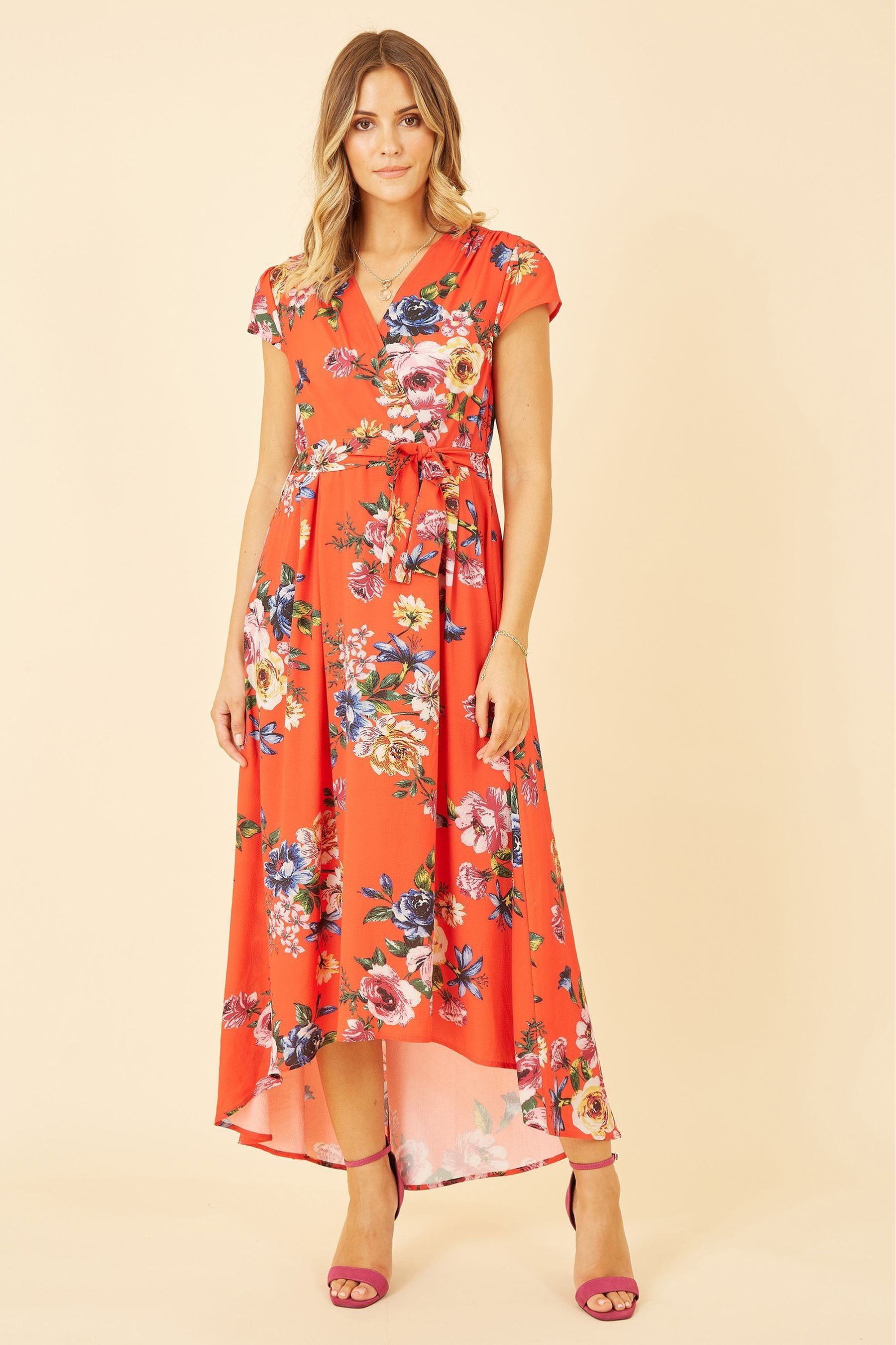 Buy Mela Orange Multi Floral Wrap Over Dipped Hem Midi Dress from Next