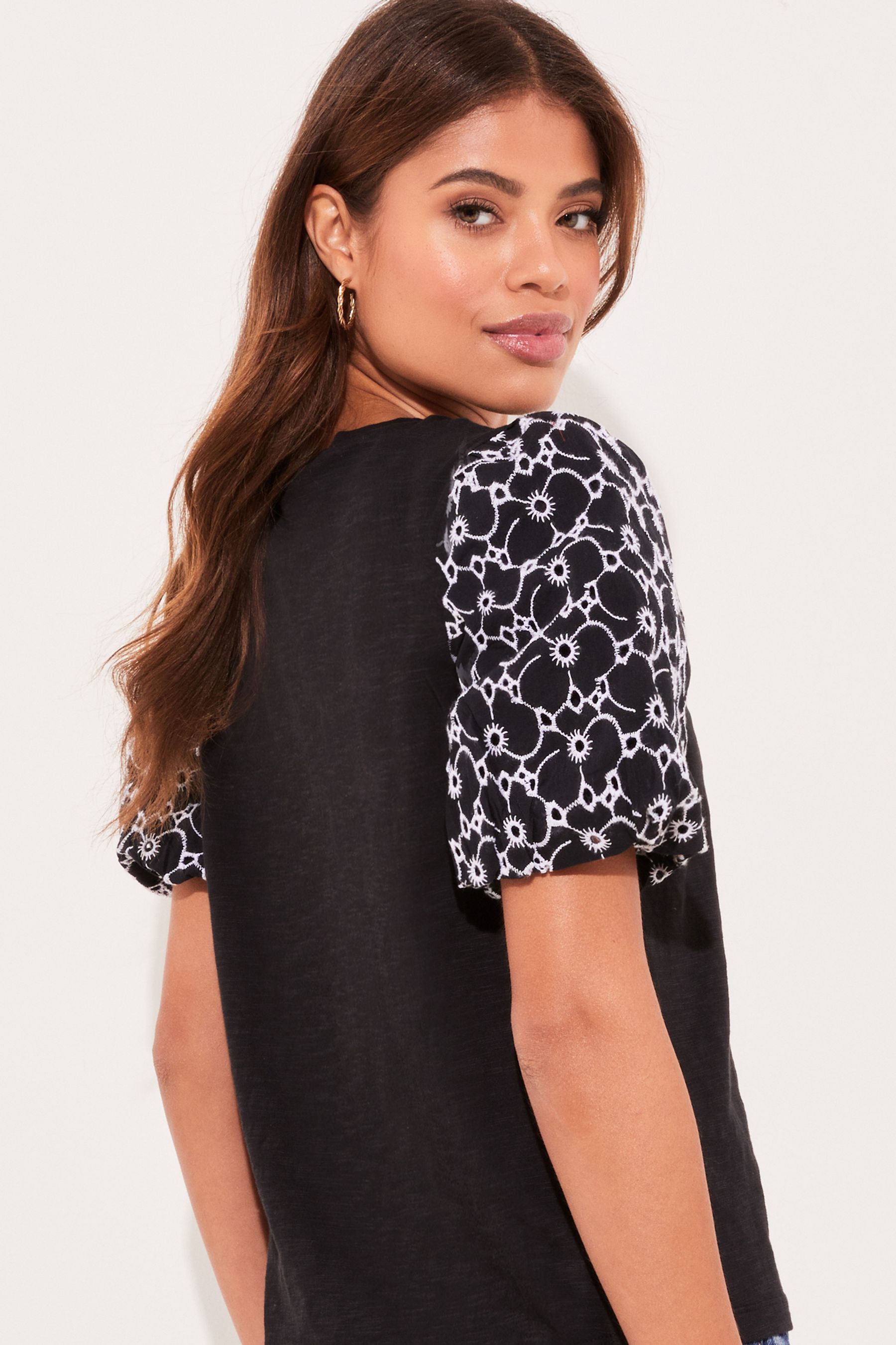 Buy Lipsy Broderie Puff Sleeve Round Neck Jersey T-Shirt from Next Malta