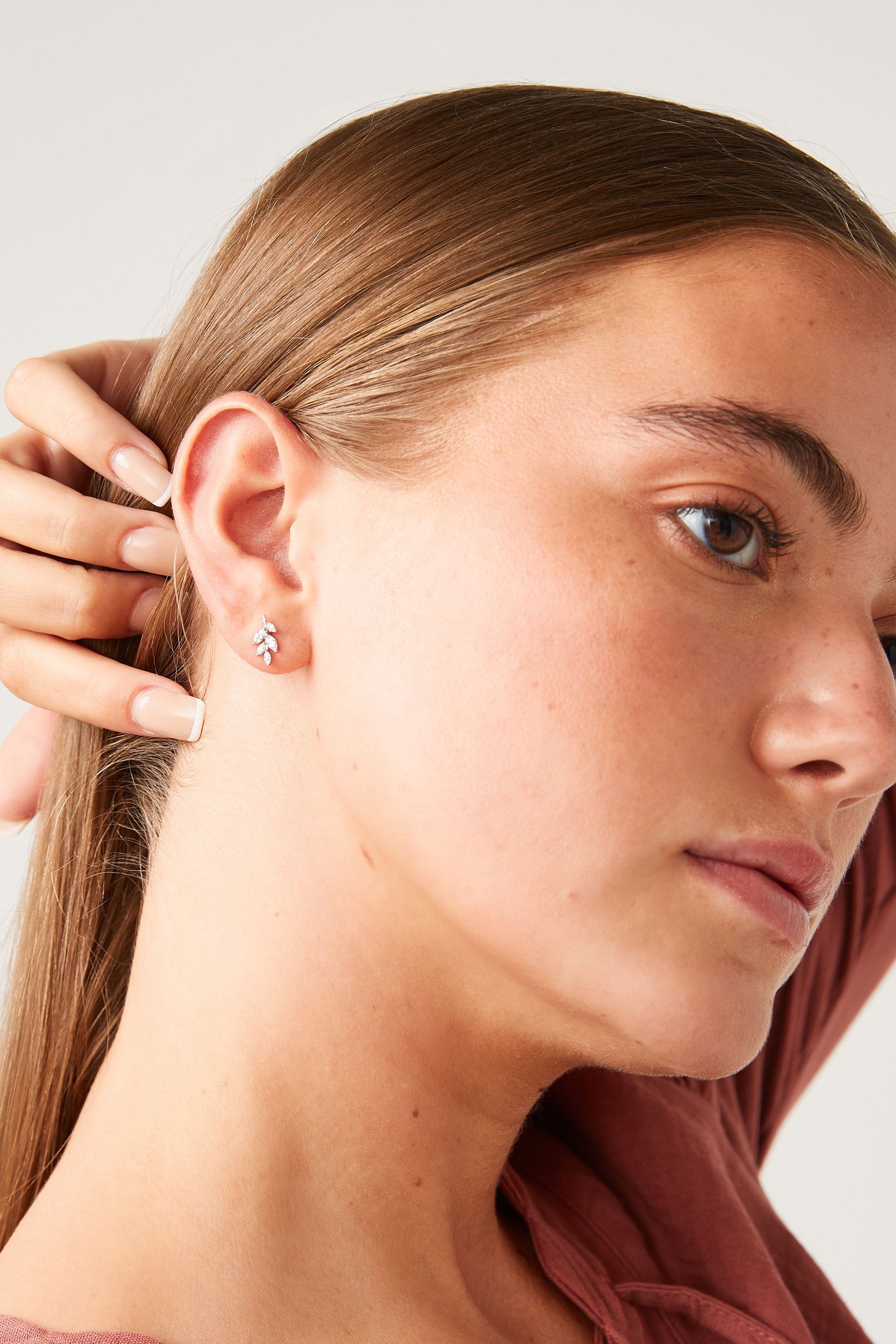 Buy Sterling Silver Sparkle Leaf Stud Earrings from Next United Arab