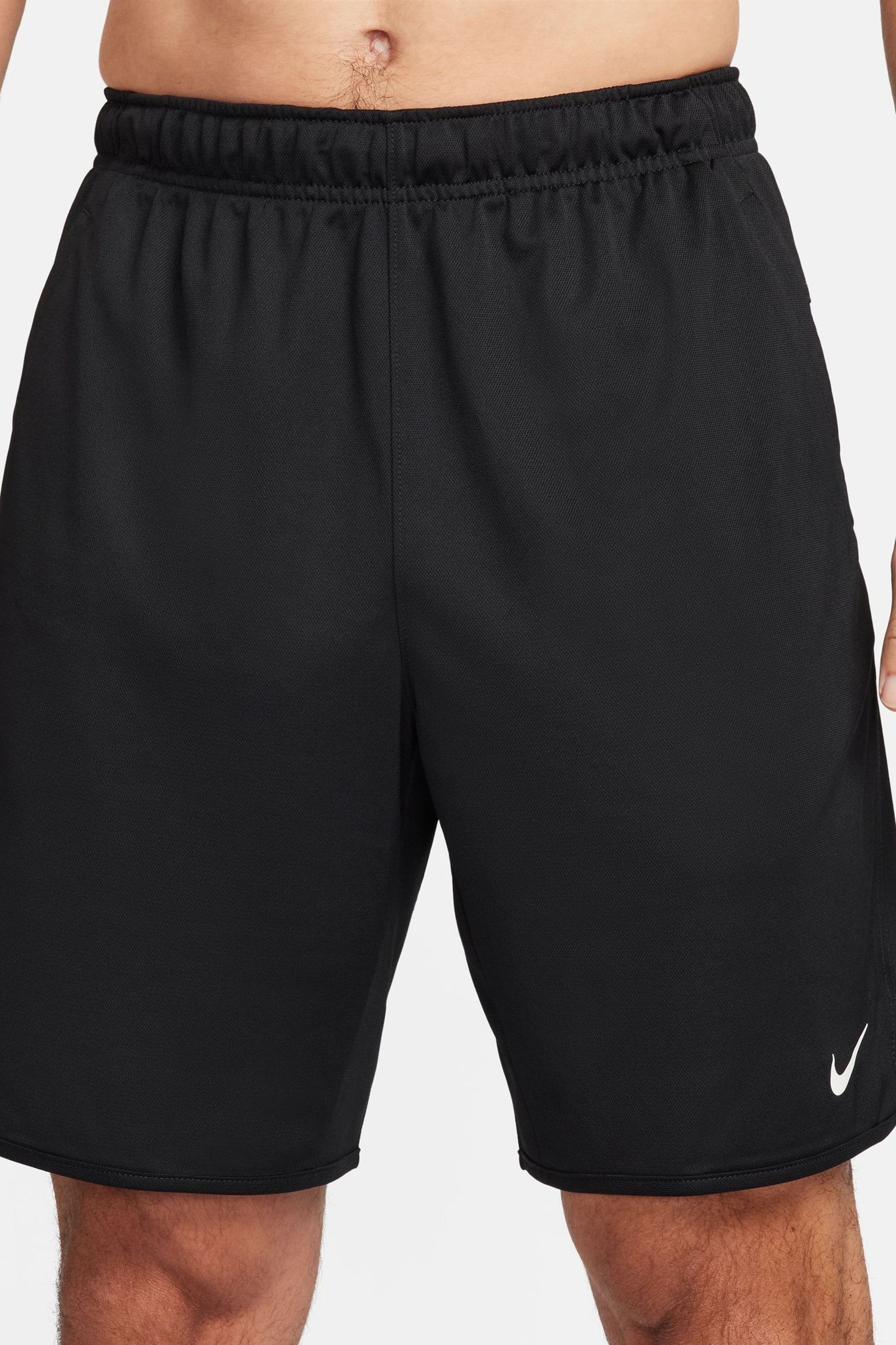 Buy Nike Black Totality DriFIT 9 inch Unlined Versatile Shorts from