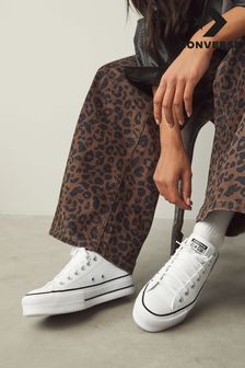 black platform trainers uk