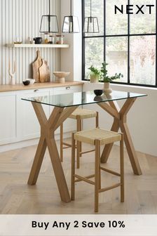 Oak and glass dining table with crossed legs deals