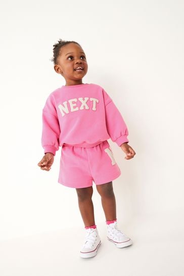 Pink logo sweater outlet