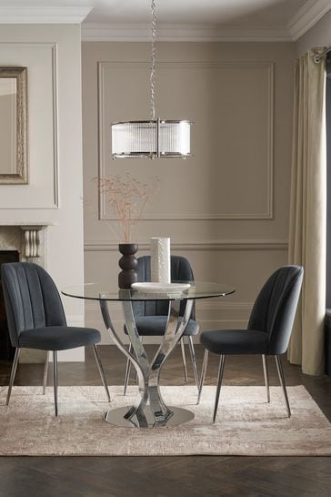 Round glass chrome dining on sale table