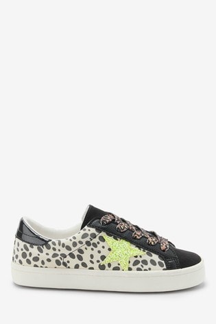 leopard and black trainers
