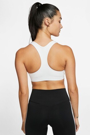 Kaufen Sie Nike Sport Bh Mit Swoosh Logo Und Mittlerem Halt Bei Next Deutschland