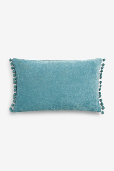 teal pom pom cushion