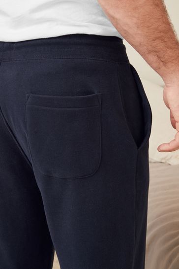Buy Navy With Stag Logo Open Hem Joggers from Next Denmark