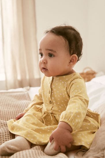 Buy Ochre Yellow Baby Jersey Dress (0mths-2yrs) from the Next UK online shop