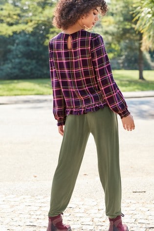 Ruffle hem long sleeve top