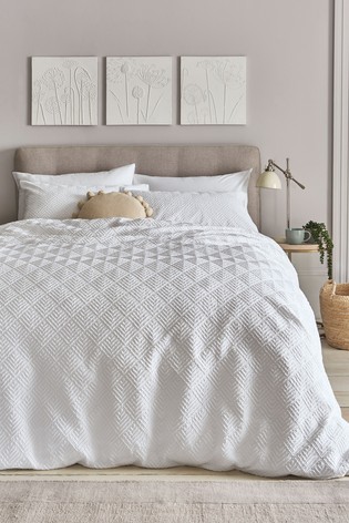 Buy Embossed Geometric Duvet Cover And Pillowcase Set from the Next UK online shop
