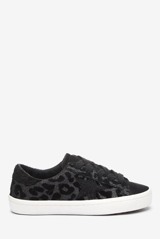 leopard and black trainers