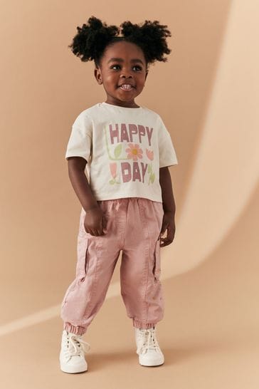 Conjunto de camiseta y pantalones cargo rosas (3 meses a 7 años)
