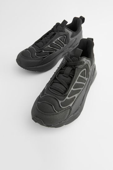 Fila plain black shoes sales