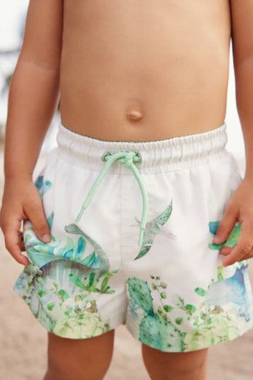 Shorts de baño estampados en color blanco/verde (3meses-7años)