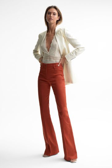 Orange 2025 flared trousers