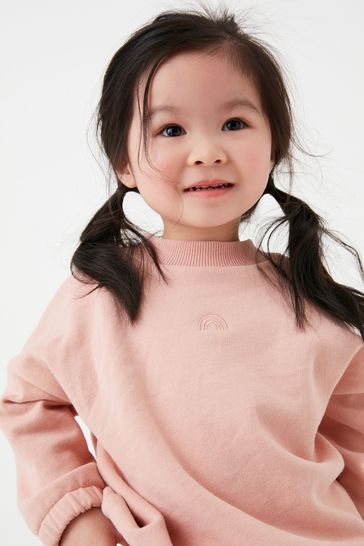 Pale pink sweatshirt on sale