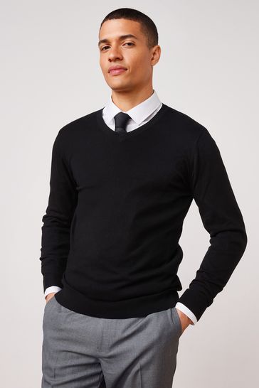 White shirt shop with black jumper