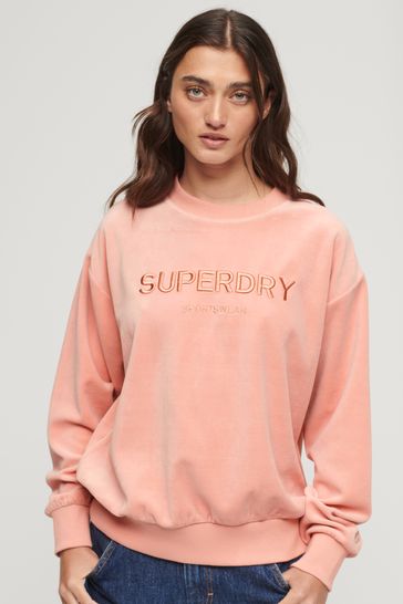 Sudadera de corte cuadrado con cuello redondo y estampado gráfico de velour en rosa melocotón de Superdry