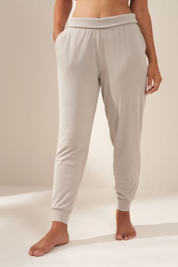 Pantalones de chándal estilo harén de canalé en gris Greige de Truly