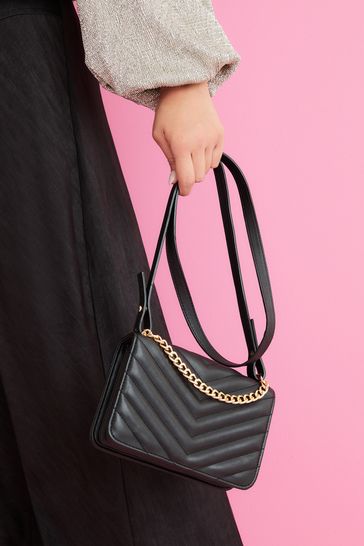 Black quilted cross body bag shop