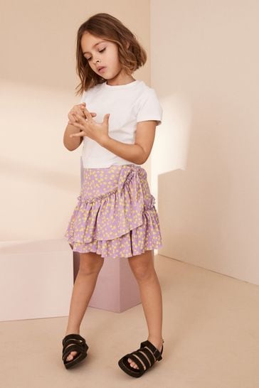 Falda cruzada lila con estampado floral (3-16años)