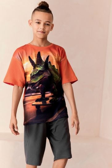 Pijama naranja corto de dinosaurio (3-16 años)