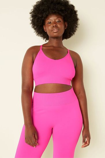 Buy Victoria's Secret PINK Atomic Pink Seamless Lightly Lined Low Impact  Sports Bra from Next Luxembourg