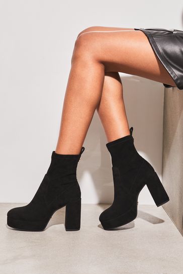 Black high heel sock boots top