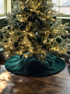 Next שטיחון דמוי פרווה מתחת לעץ חג המולד