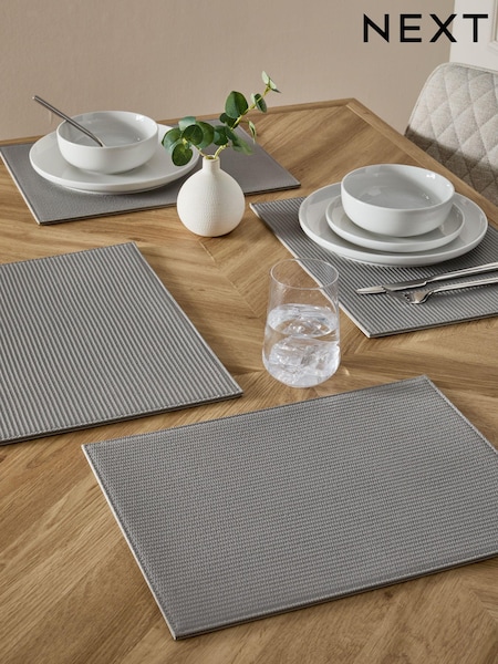 Set of 4 Grey Bronx Textured Faux Leather Placemats (125823) | £24