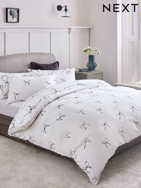 2 Pack Black/White Bow & Heart Reversible Duvet Cover and Pillowcase Set (AN1738) | £29 - £61