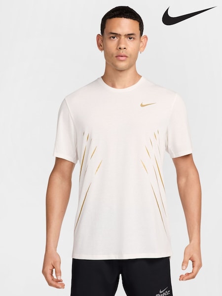 Nike White/Gold Dri-FIT Jakob Ingebrigtsen Running T-Shirt (AT5156) | £50