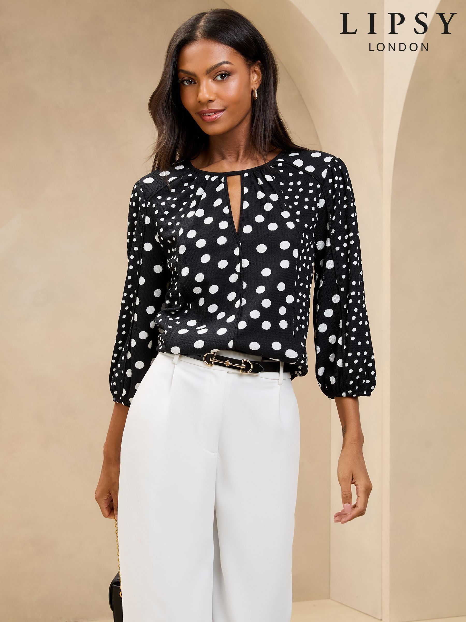 Tan polka dot top online