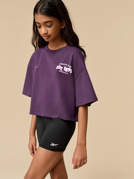 Reebok Girls Oversized Cropped 100% Cotton Graphic T-Shirt (B42435) | £10 - £16