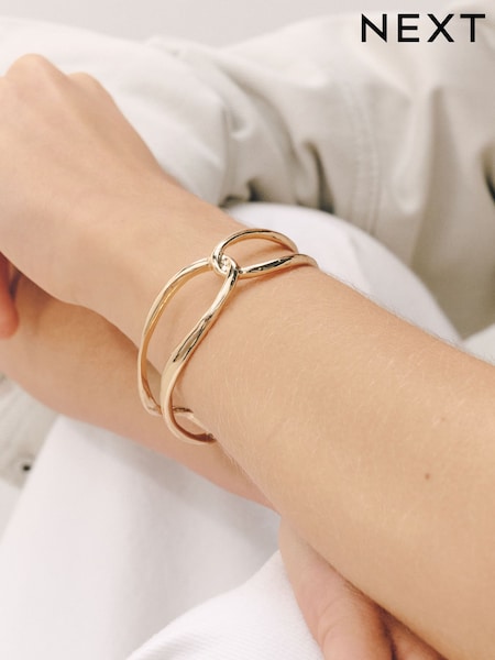 Gold Tone - Cross Over Cuff Bracelet