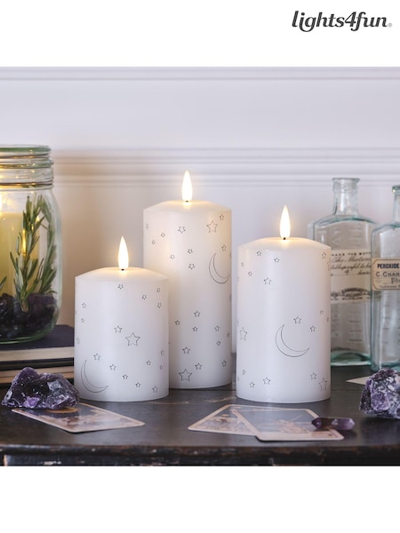 Lights4fun White Truglow LED Pillar Candles with Moon Star Design Set of 3 (E66254) | £33