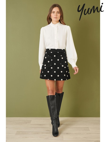 Yumi Black Mini Corduroy Embroidered Daisy Skirt (E92882) | £45