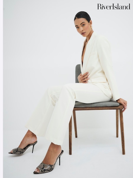 River Island Cream Slim Flare Trousers (F40331) | £40