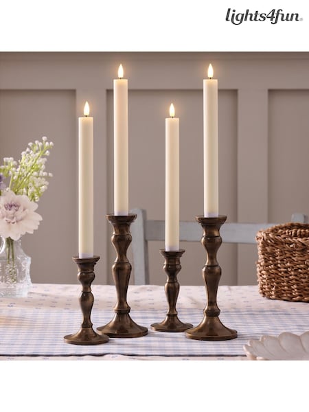 Lights4fun Set of 4 Natural Rechargeable TruGlow Taper Candles (F60369) | £45