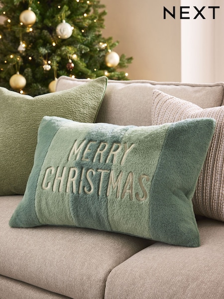 Green 40 x 59cm Christmas Slogan Faux Fur Oblong Cushion (F61461) | £16